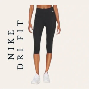 0507W. NIKE DRI FIT MID RISE CAPRIS BLACK IN COLOR SZ SMALL EMBROIDERED LOGO